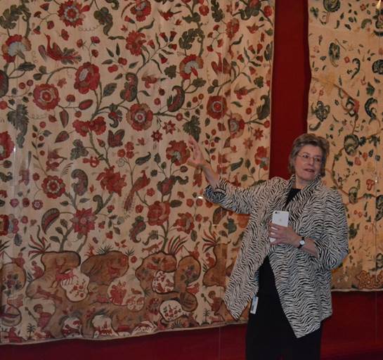 Linda Eaton discussing large embroidery